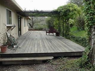 9696 Cherry Ridge Road Sebastopol, CA 95472 - Photo 4 of 5 a terrace of a house with table and chairs