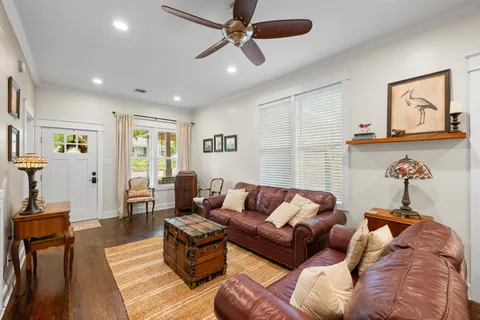 a living room with furniture and a window