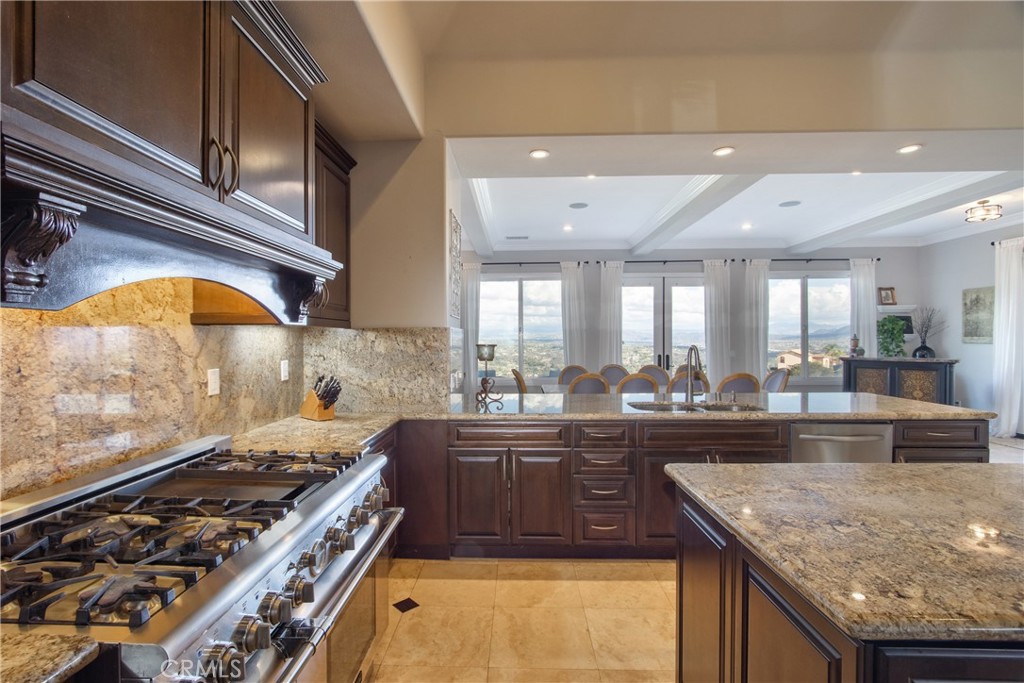 44195 Vía Horca Temecula, CA 92590 - Photo 17 of 74 a kitchen with sink stove and cabinets