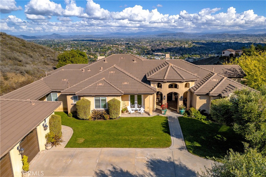 44195 Vía Horca Temecula, CA 92590 - Photo 2 of 74 a view of a big house with a big yard and large tree