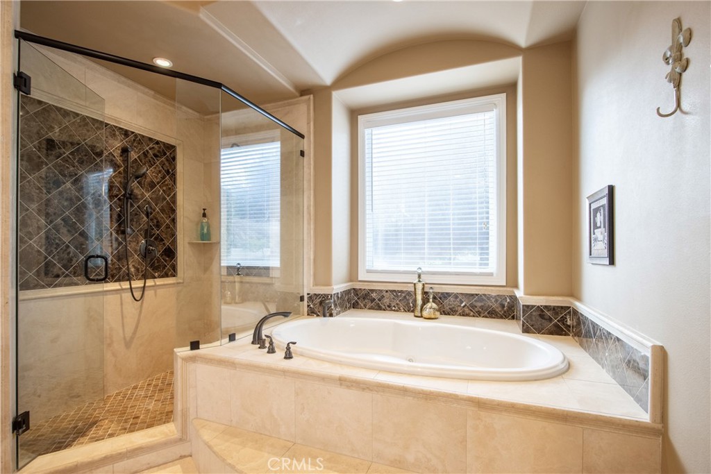 44195 Vía Horca Temecula, CA 92590 - Photo 28 of 74 a bathroom with a bathtub and a shower