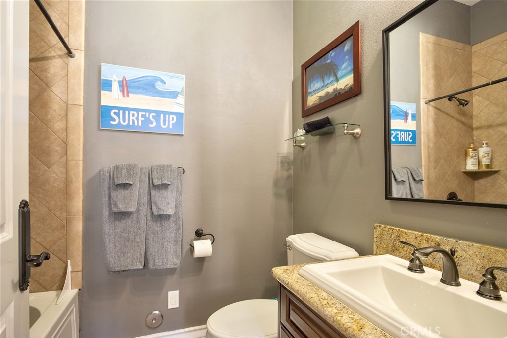 44195 Vía Horca Temecula, CA 92590 - Photo 39 of 74 a bathroom with a sink toilet and a mirror