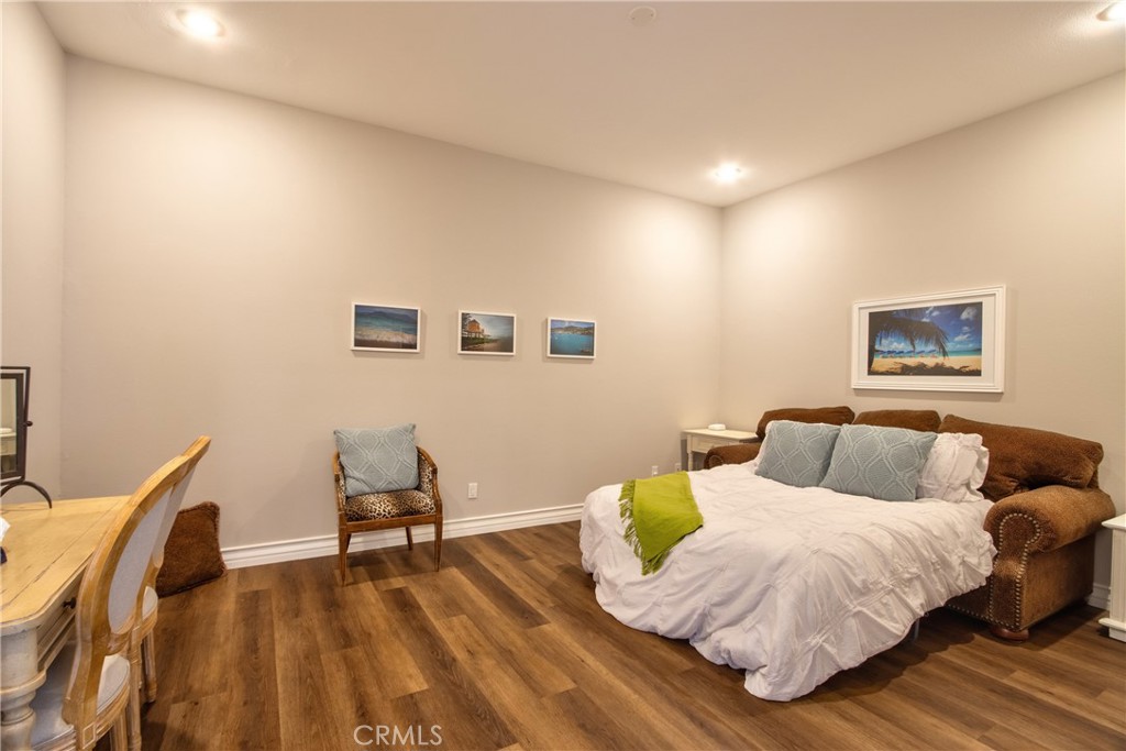 44195 Vía Horca Temecula, CA 92590 - Photo 42 of 74 a bed room with a bed and a chair