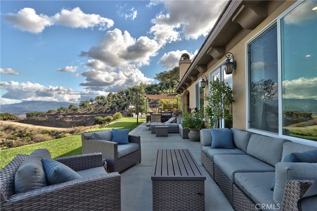 44195 Vía Horca Temecula, CA 92590 - Photo 43 of 74 a view of a patio with couches and pool