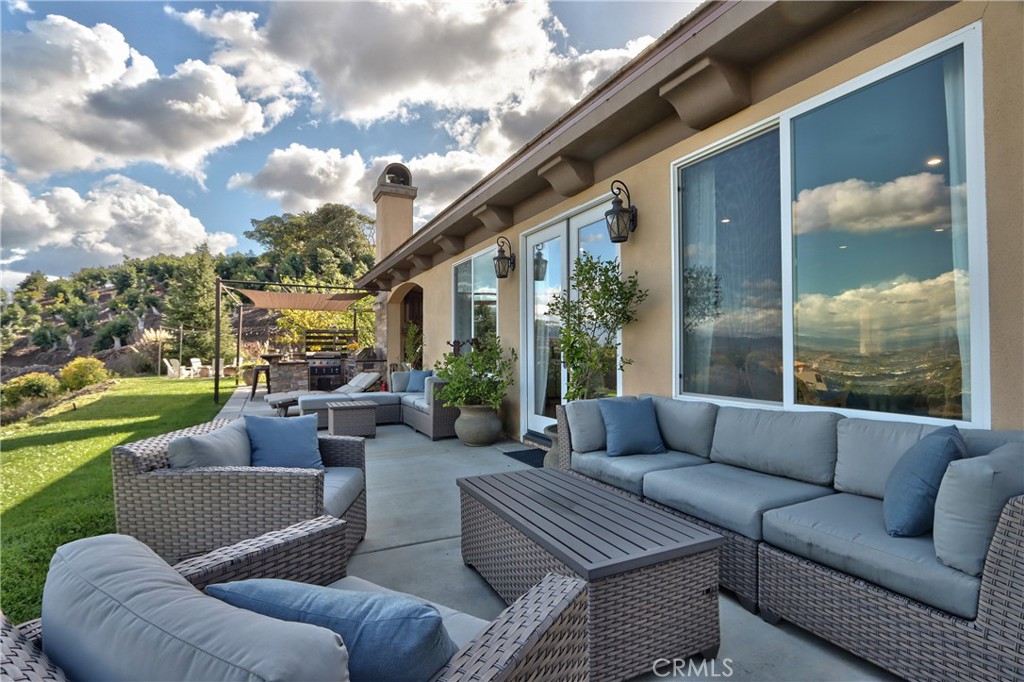 44195 Vía Horca Temecula, CA 92590 - Photo 46 of 74 a view of a patio with couches and a big yard