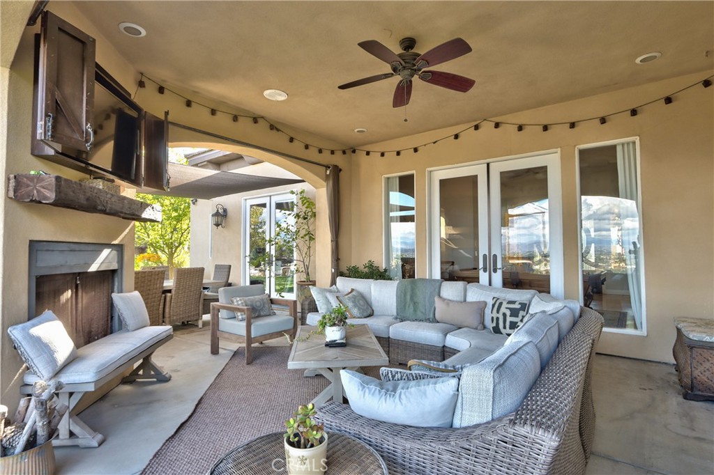 44195 Vía Horca Temecula, CA 92590 - Photo 49 of 74 a living room with furniture fireplace and a large window