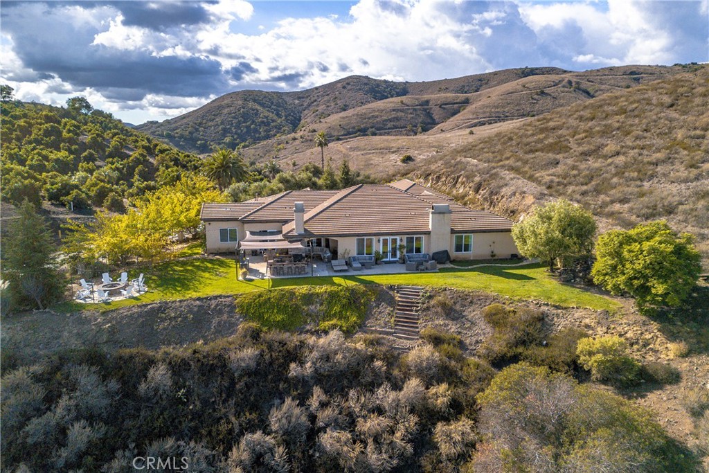 44195 Vía Horca Temecula, CA 92590 - Photo 74 of 74 a view of a house with a big yard and large trees