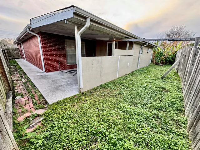 a view of front of house with potted plants