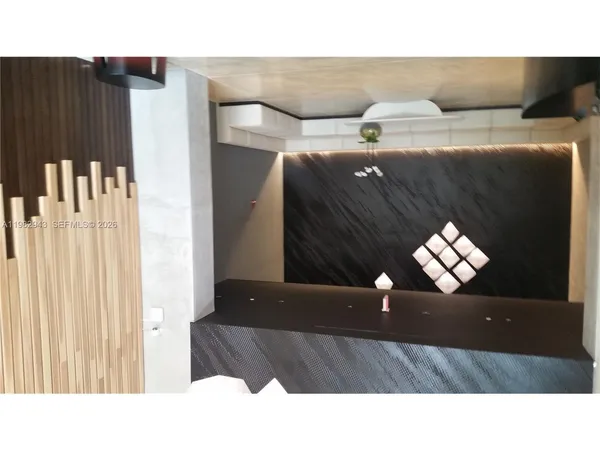 a view of living room with balcony