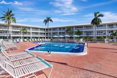 a view of a swimming pool with a patio