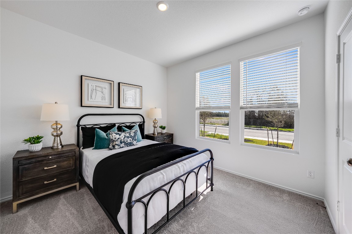 1819 Bear Grass Rdg Road Temple, TX 76501 - Photo 12 of 23 Bedroom featuring carpet flooring and baseboards