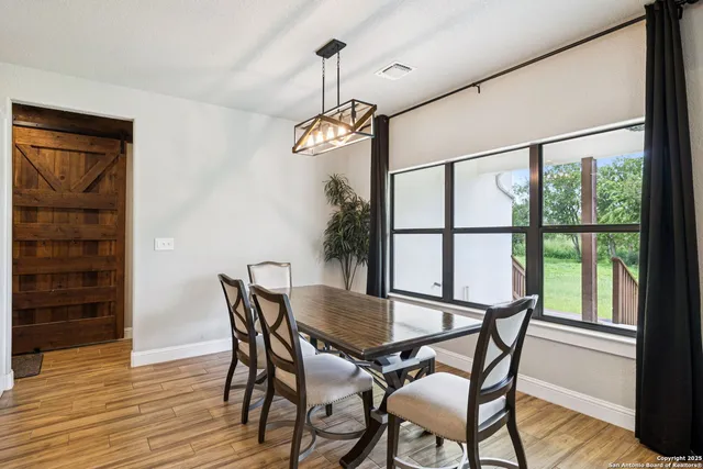 a bedroom with a bed and furniture