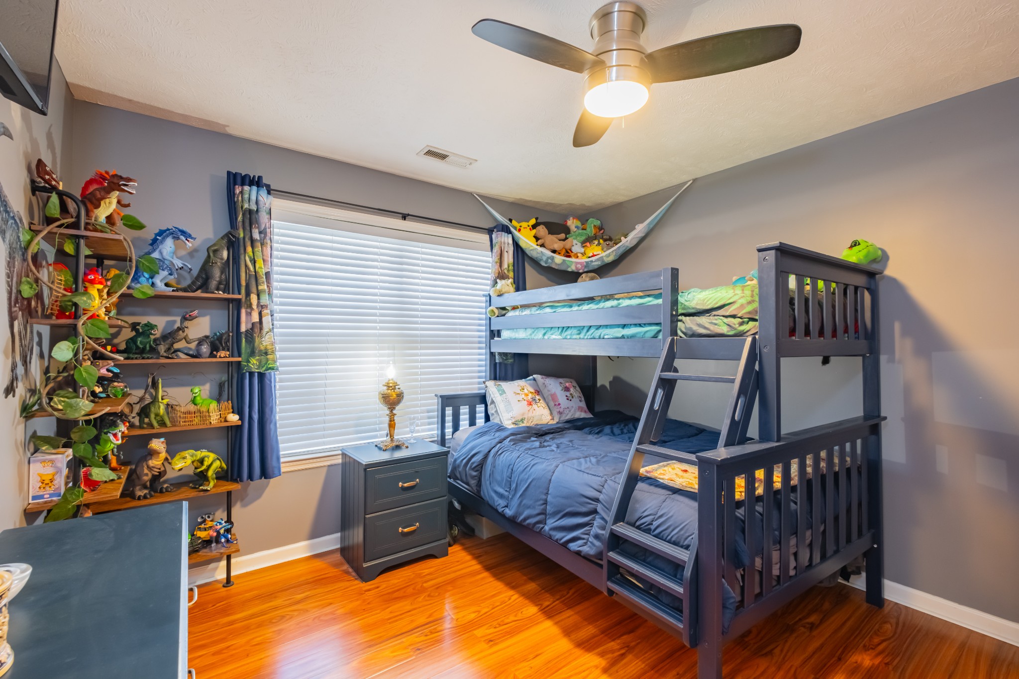 118 Hamilton Court Manchester, TN 37355 - Photo 22 of 40 a bedroom with furniture and a fireplace