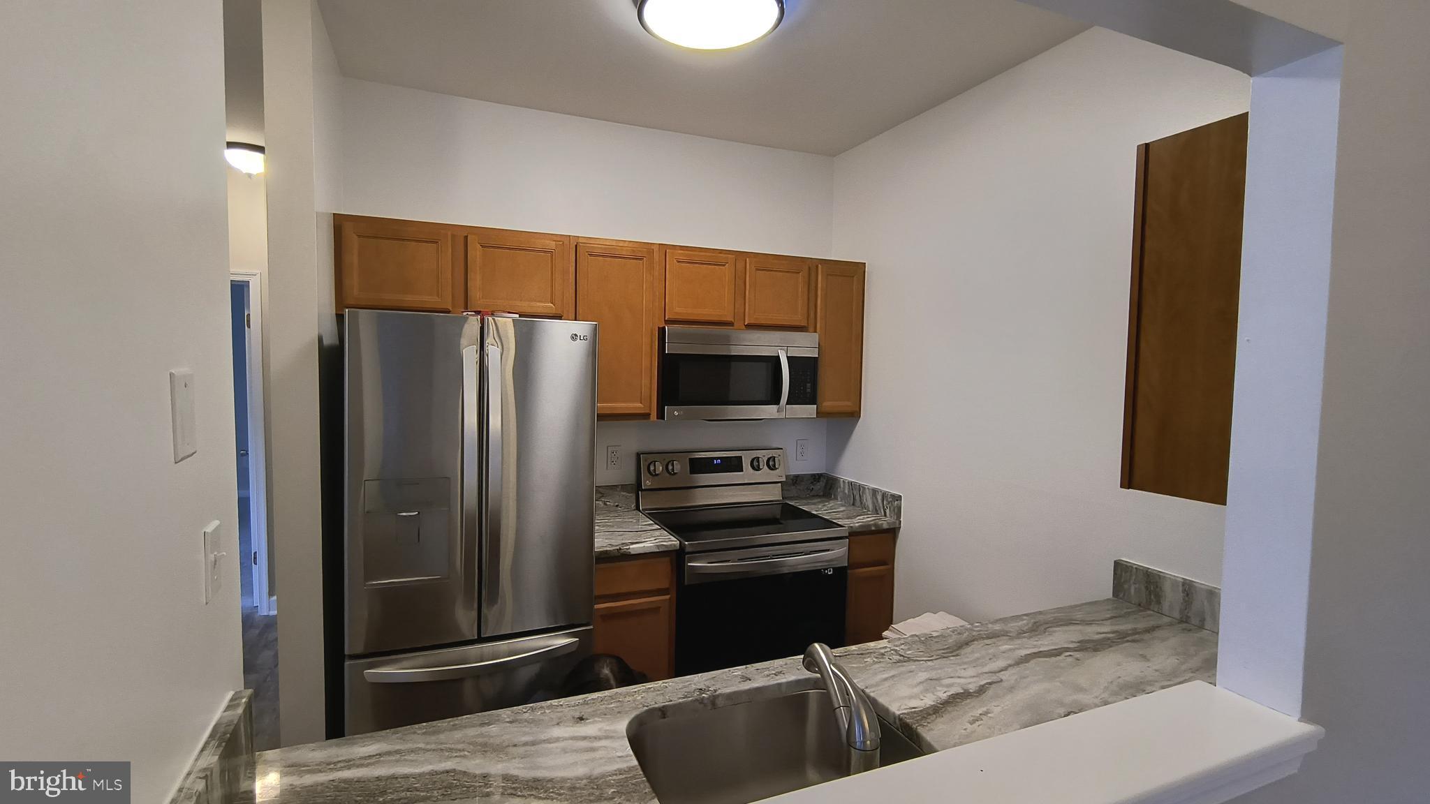 602 Moonglow Road, Unit 202 Odenton, MD 21113 - Photo 2 of 17 KITCHEN