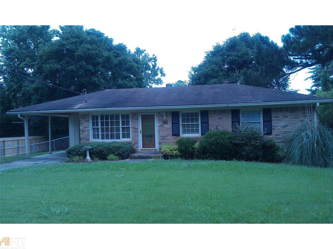 19 Cameo Drive Rome, GA 30165 - Photo 1 of 1 a black and white house with a garden