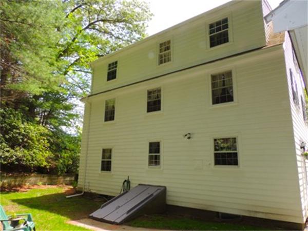 281 Lexington Road Concord, MA 01742 - Photo 16 of 16 a view of a house with backyard