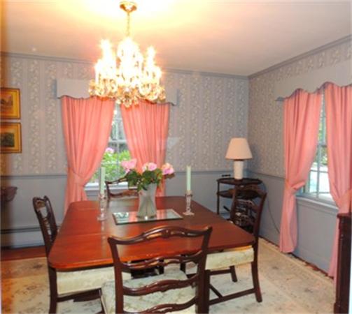 281 Lexington Road Concord, MA 01742 - Photo 3 of 16 a dining room with furniture a chandelier and window