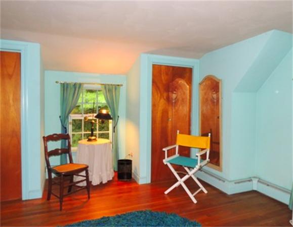281 Lexington Road Concord, MA 01742 - Photo 8 of 16 a room with furniture and wooden floor