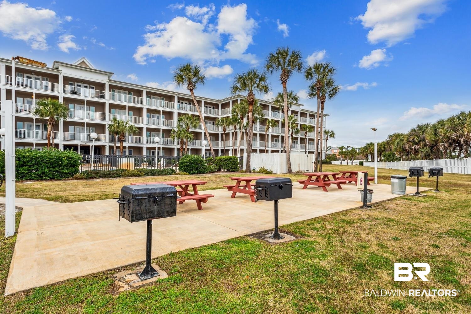 13551 Johnson Beach Road, Unit 112E Pensacola, FL 32507 - Photo 28 of 42 View of home's community with a yard