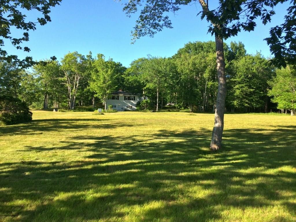 202 Little Deer Isle Road Little Deer Isle, ME 04650 - Photo 27 of 35 showing the expansive lawn in front...