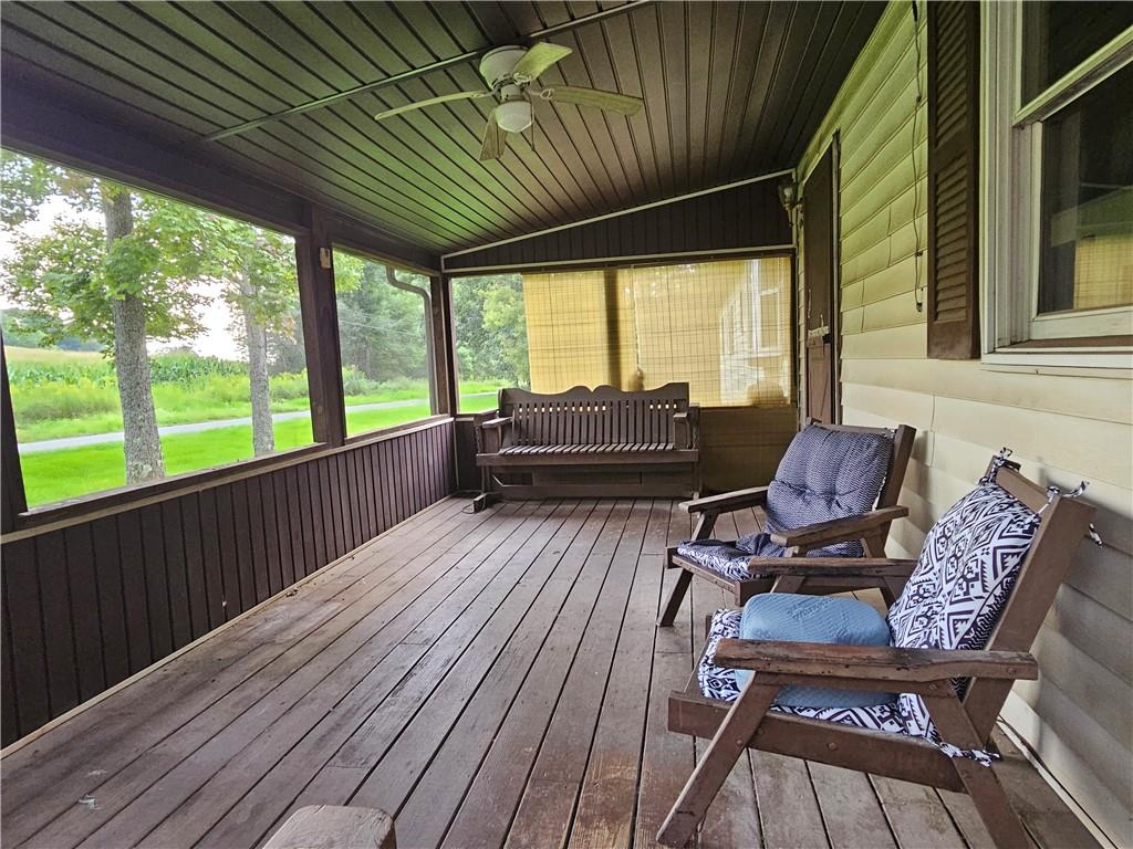 207 Calico Road West Sunbury, PA 16061 - Photo 23 of 37 Screened porch