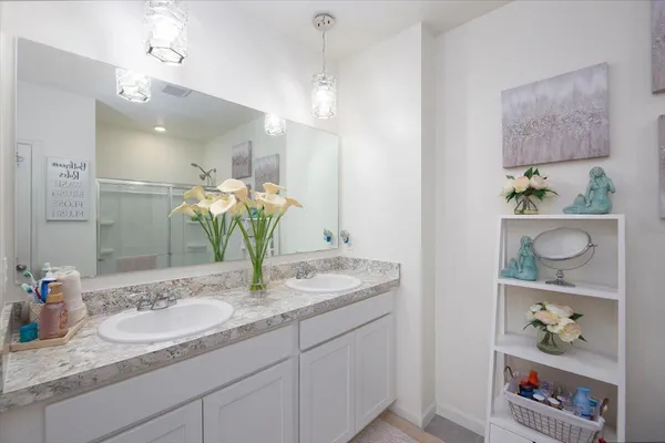 a bedroom with a bed and a closet