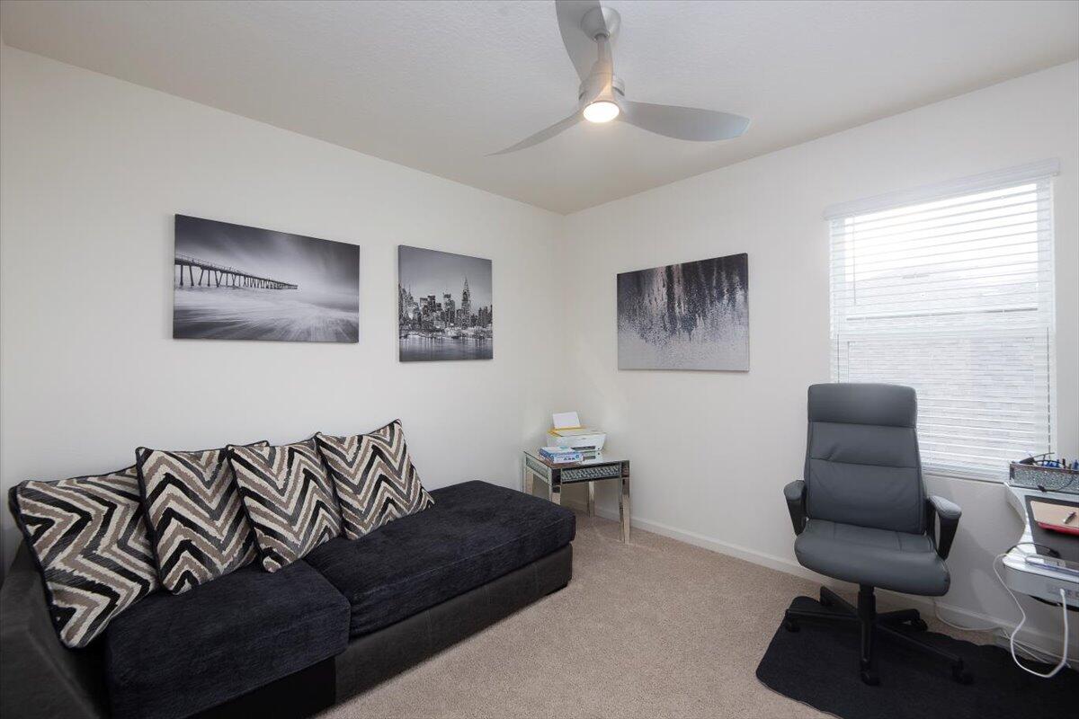 12314 Rimini Way Port St. Lucie, FL 34987 - Photo 37 of 48 a living room with furniture