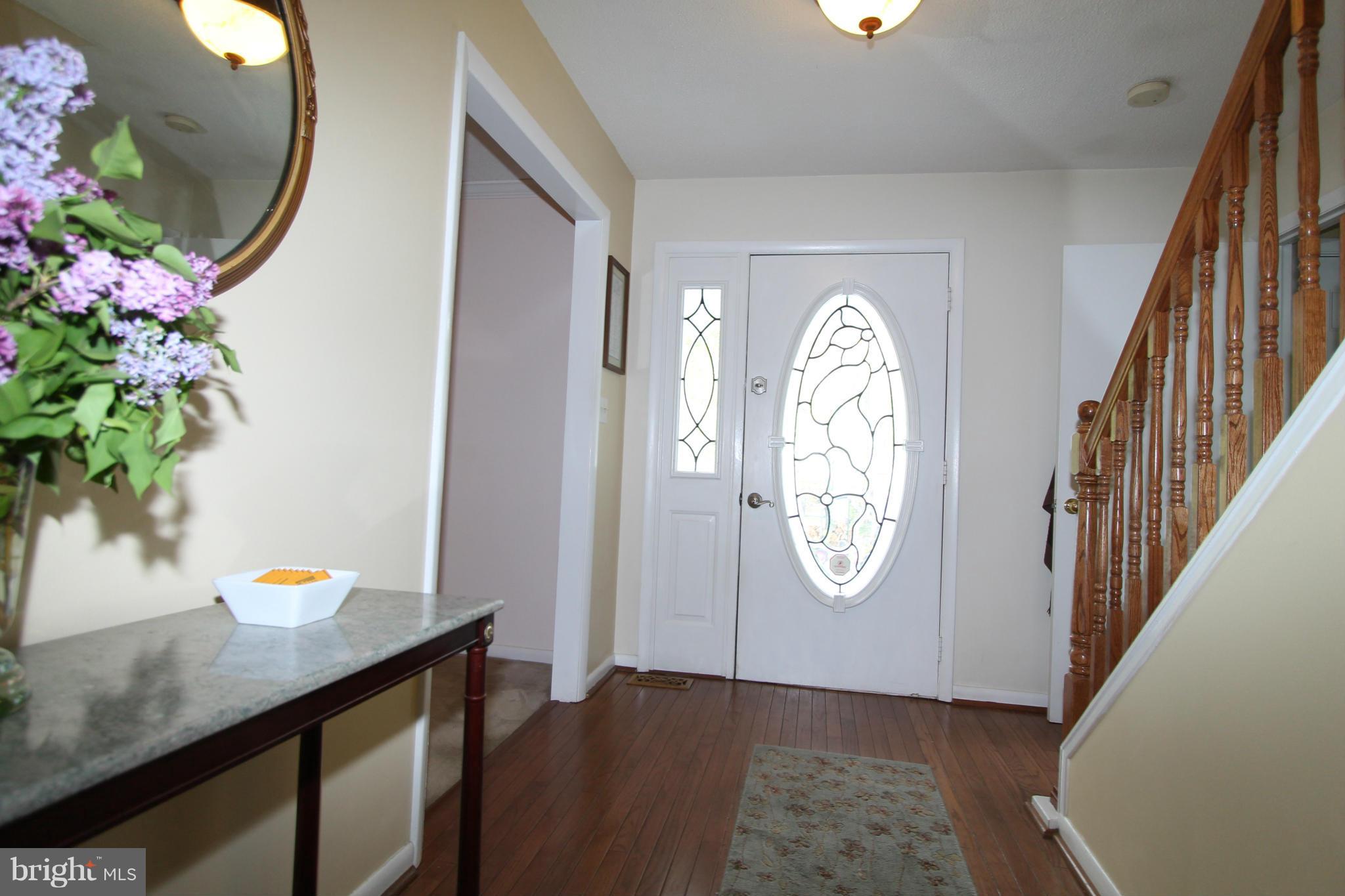 2909 Accokeek Road West Accokeek, MD 20607 - Photo 22 of 30 a view of entryway with paintings on the wall