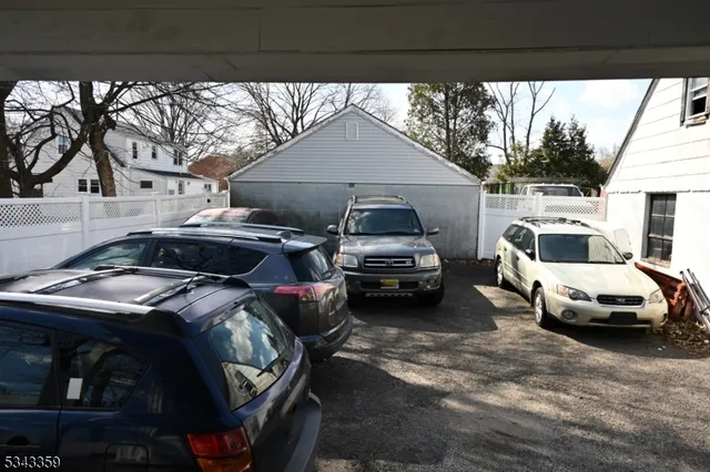 a view of house with roof deck