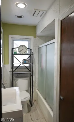 a picture of door with a bathroom