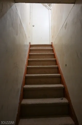 a kitchen that has a sink and a stove in it