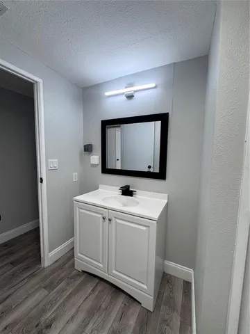 a utility room with a sink washer and dryer