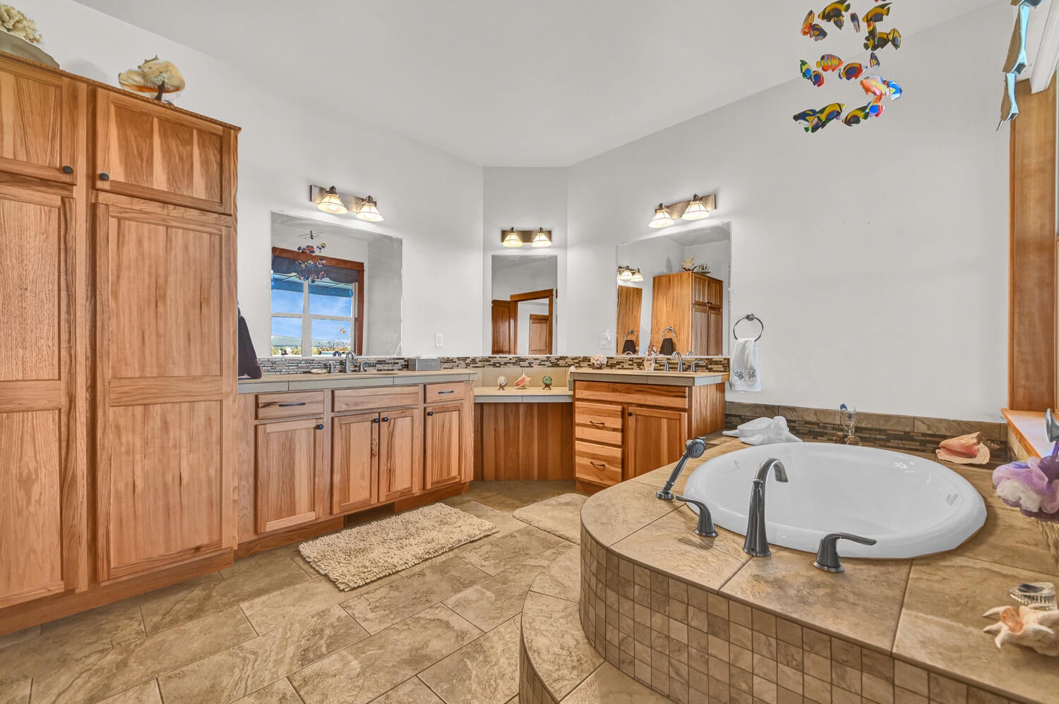 62860 Deschutes Road Bend, OR 97701 - Photo 22 of 34 Double vanity and and large built in linen cabinets