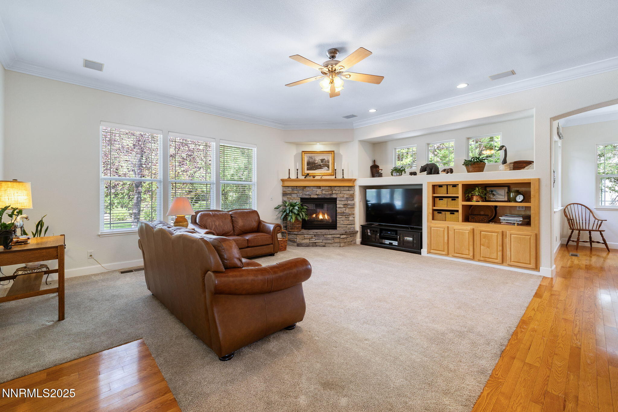 4865 Buckhaven Road Reno, NV 89519 - Photo 12 of 47 a living room with furniture and a fireplace