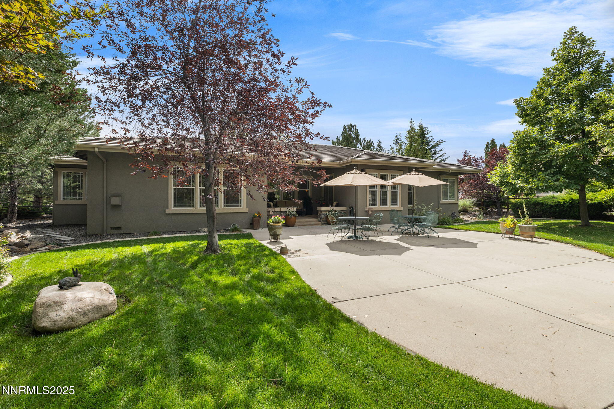 4865 Buckhaven Road Reno, NV 89519 - Photo 2 of 47 a view of a house with garden and yard