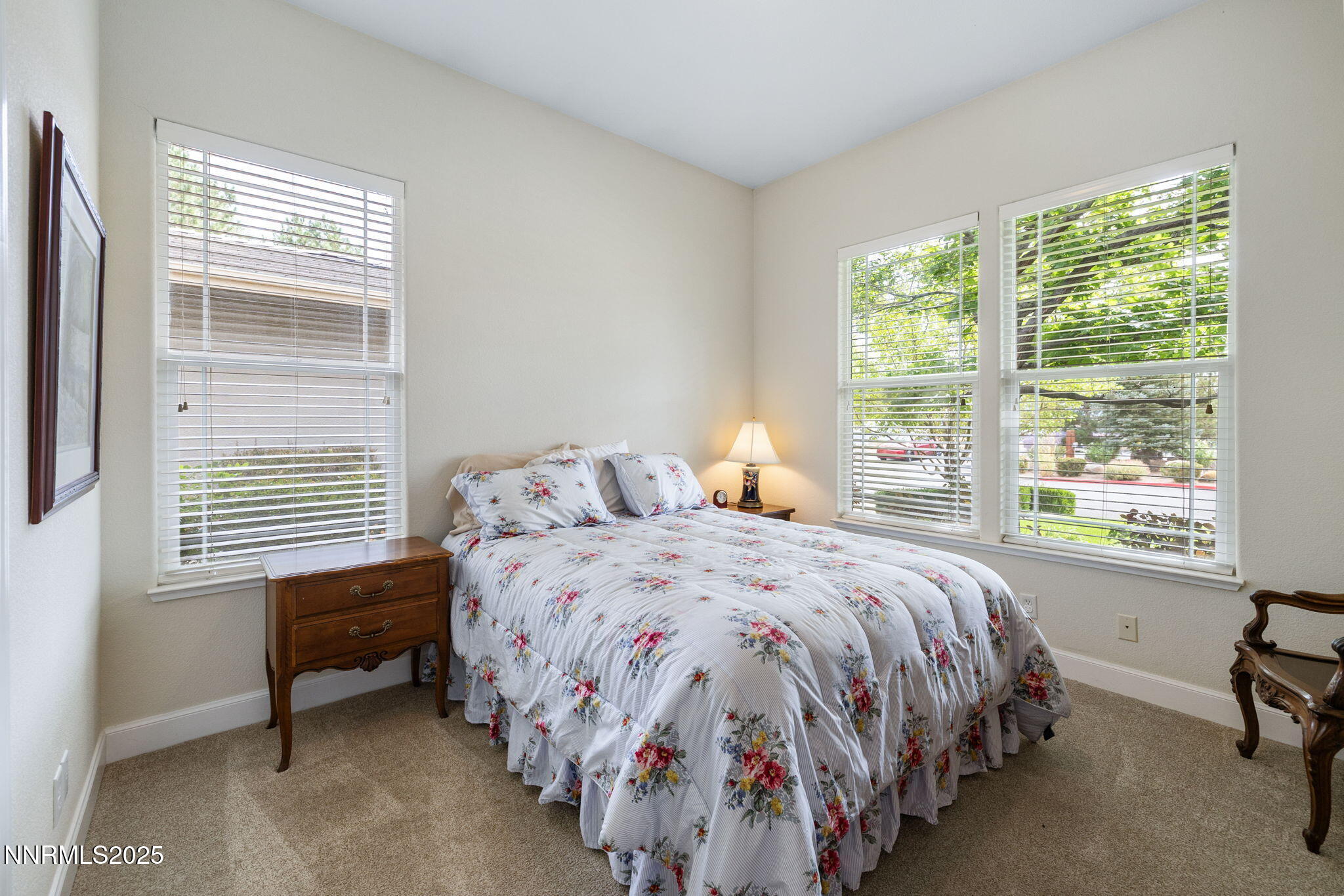 4865 Buckhaven Road Reno, NV 89519 - Photo 28 of 47 a bedroom with a bed and a window