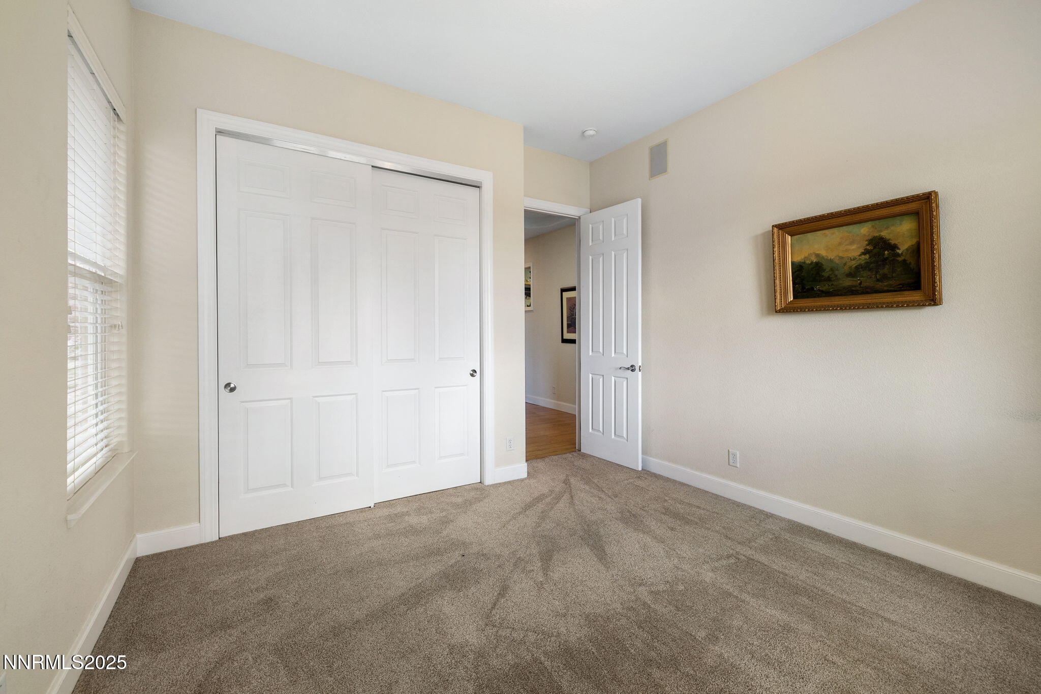 4865 Buckhaven Road Reno, NV 89519 - Photo 32 of 47 a view of a livingroom with an empty space and a window