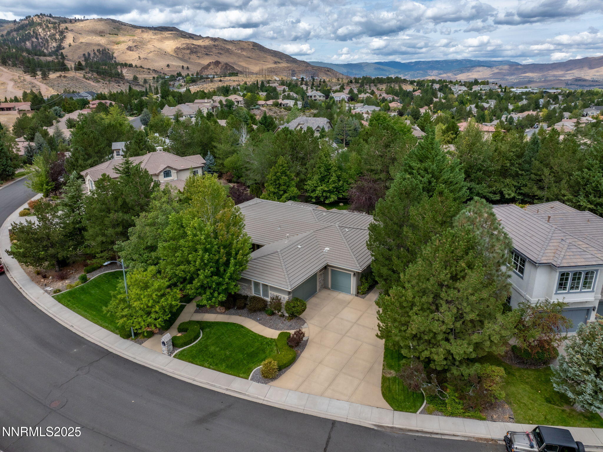 4865 Buckhaven Road Reno, NV 89519 - Photo 41 of 47 an aerial view of residential houses with outdoor space and street view