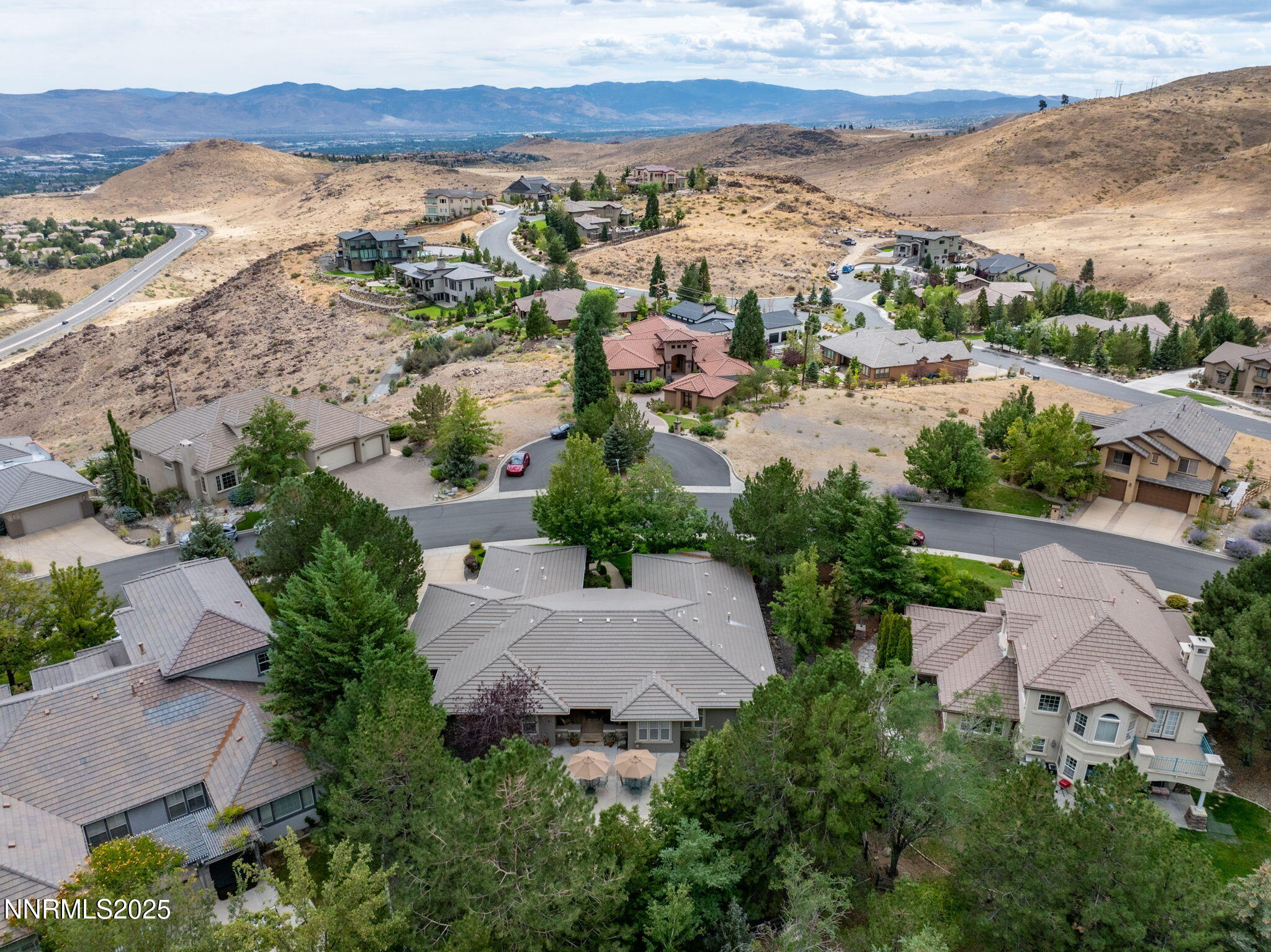 4865 Buckhaven Road Reno, NV 89519 - Photo 42 of 47 an aerial view of residential houses with outdoor space