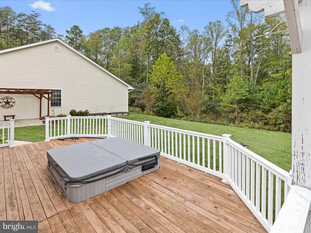 a view of a house with a door and a chair