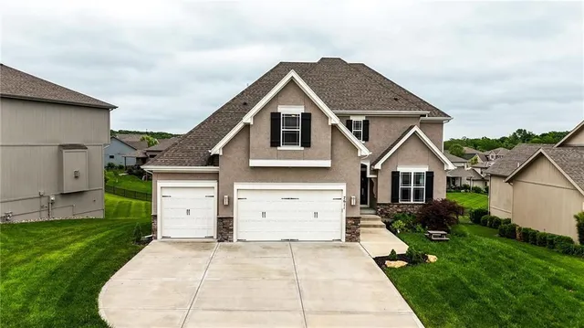 $557,500 | 7611 North Adrian Avenue, Kansas City, MO 64151