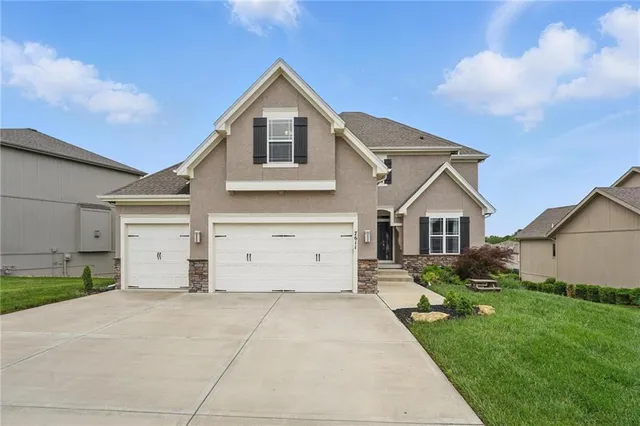 $557,500 | 7611 North Adrian Avenue, Kansas City, MO 64151