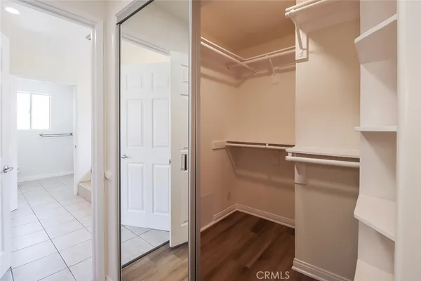 a view of an empty walk in closet