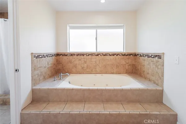 a bathroom with a bathtub