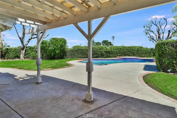 a park view with a street sign
