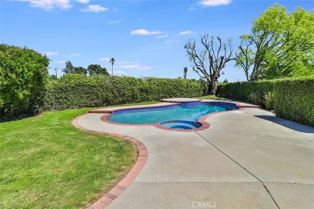 a view of swimming pool with outdoor space
