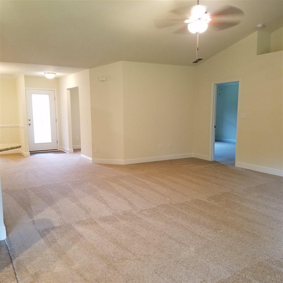 1439 Promenade Loop Cantonment, FL 32533 - Photo 13 of 36 Large grate room designed for company