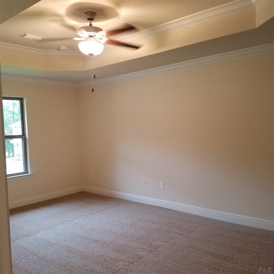 1439 Promenade Loop Cantonment, FL 32533 - Photo 22 of 36 large master suite with recessed tray ceiling