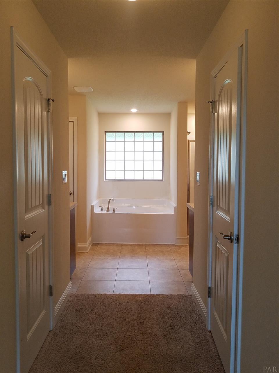1439 Promenade Loop Cantonment, FL 32533 - Photo 23 of 36 master bath with two walk in closets