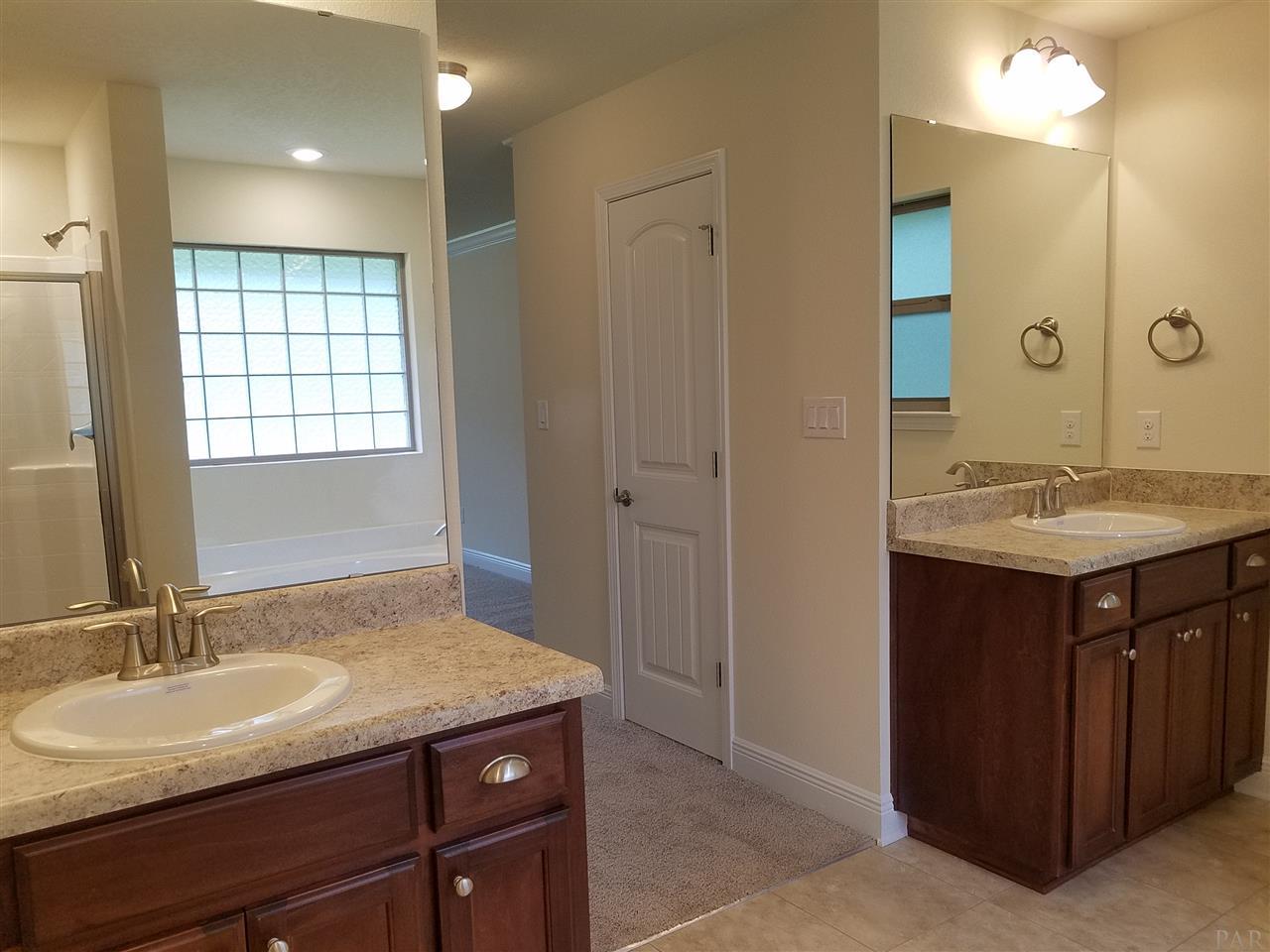 1439 Promenade Loop Cantonment, FL 32533 - Photo 27 of 36 separate his and hers vanities